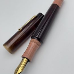 Essenza Ibrida Amber salmon ebonite